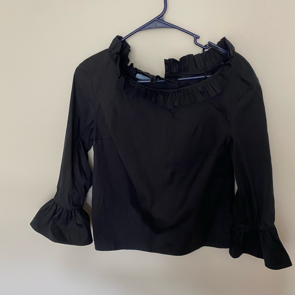 Prada ruffled top.